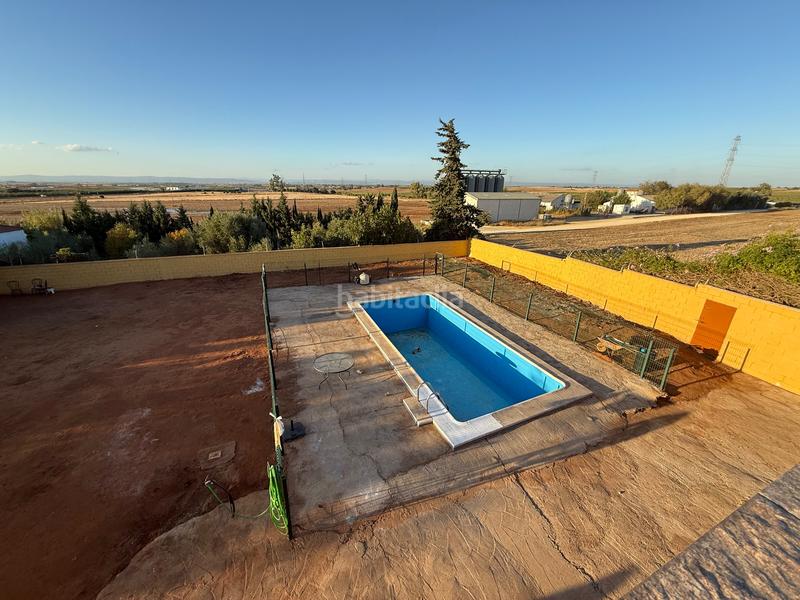 Foto b0840ebe-8045-4ac2-a7f6-7667bee9548d. Xalet amb xemeneia aparcament piscina a Carmona