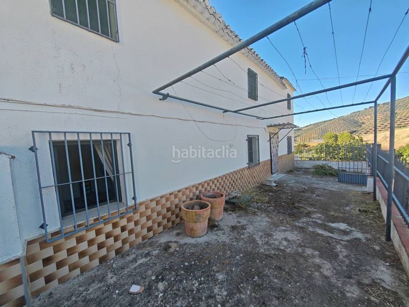 Foto 15bc9c6c-87db-4f75-81f8-9b50b65a2a1f. Masia amb aparcament a Loja