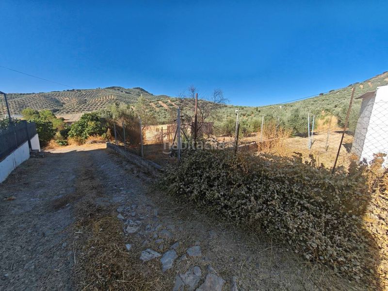 Foto 33f909e2-26d5-4a98-b6b6-e58547a701e0. Masia amb aparcament a Loja