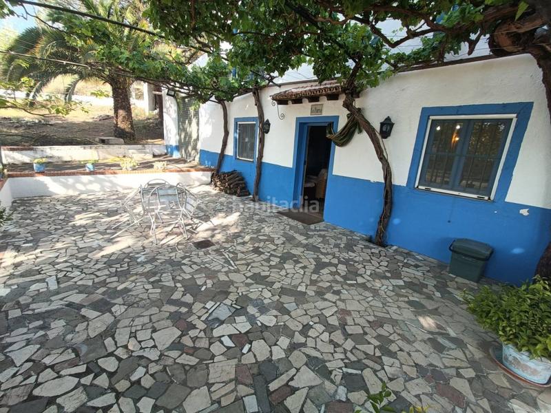 Foto 0215d63d-8f29-47d0-8b43-ba486a304bfa. Finca rústica cortijo en venta en Huétor Tájar