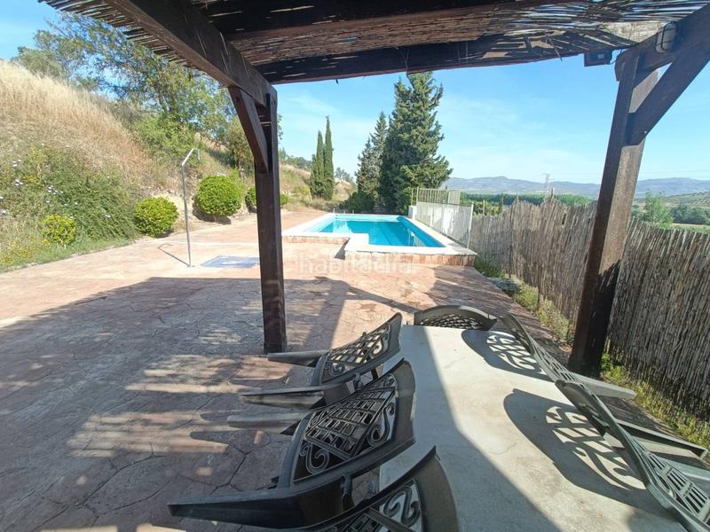 Foto 55b4d41d-6d26-4d19-98e6-e2adb498f013. Finca rústica cortijo en venta en Huétor Tájar