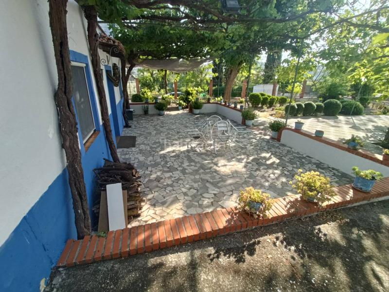 Foto 82e9bdcb-bf77-4b0d-8062-301b897be4d2. Finca rústica cortijo en venta en Huétor Tájar