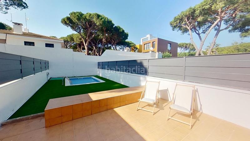 Foto cd7d0cf0-73f1-4f1c-a52c-67c1e83bcf70. Casa adossada amb calefacció aparcament piscina a Castelldefels