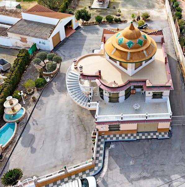 Foto 4f4ffe1a-8a9a-4bd2-a8bb-a50e6ae0da7e. Casa amb calefacció aparcament a Loja