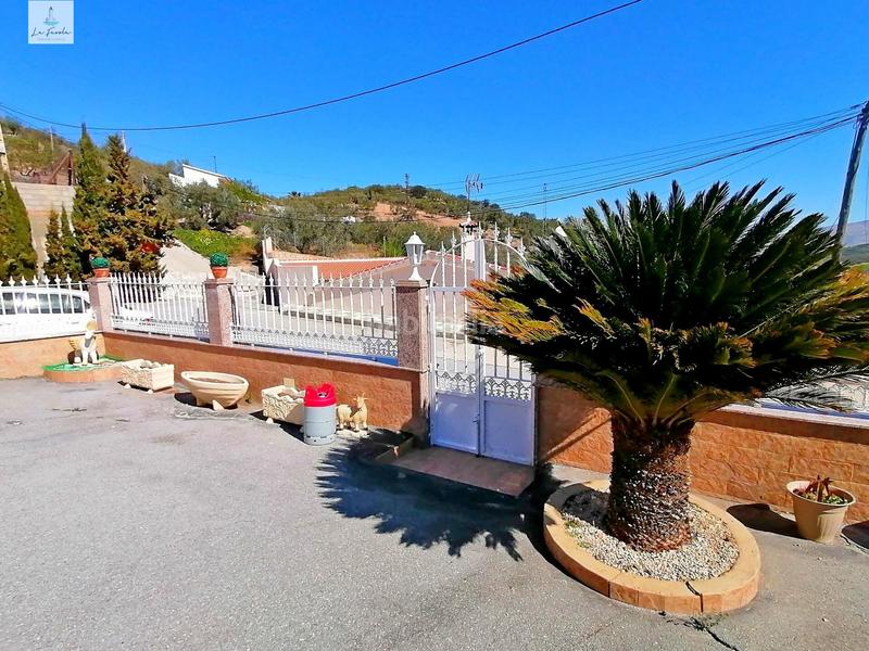 Foto a6ac8d96-66fc-4108-a23a-3ccad85d4fdd. Casa amb calefacció aparcament a Loja