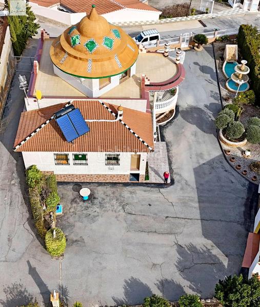 Foto c13f0e59-92ea-4c6d-afa8-e81b814bdc75. Casa amb calefacció aparcament a Loja