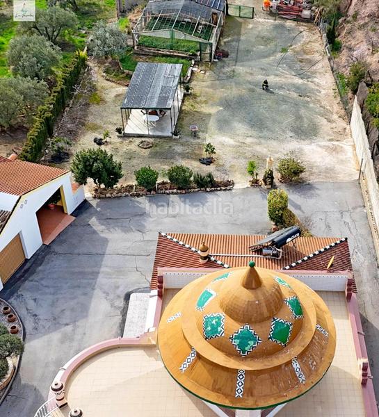 Foto e1643345-b98d-4746-878b-515d72064020. Casa amb calefacció aparcament a Loja