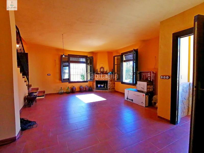 Foto a102c50e-05db-4068-ada8-bb115639b3eb. Casa adosada casa estilo rustica de 5 dormitorios en Archidona