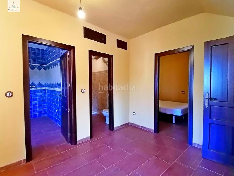 Foto a44a8d63-6c68-4c45-bb7c-341099474e71. Casa adosada casa estilo rustica de 5 dormitorios en Archidona