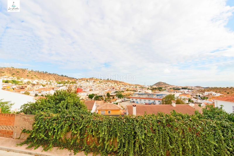 Foto 1638dcd0-a27e-49bd-81ed-7db8cd18d604. Casa amb aparcament a Fuente Alegre - El Chaparral - Los Morales Málaga