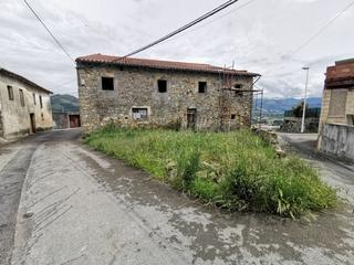 Casa a Voto. Dos casas de piedra adosadas a rehabilitar con tejado reformado