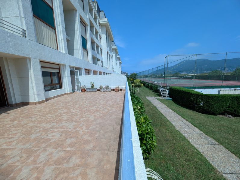 Foto 533a88fa-6e77-4b67-ae6b-fcef628c7dff. Piso en Laredo - calle enrique mowinckel- rcia amanecer 84 bajo en la playa en Laredo