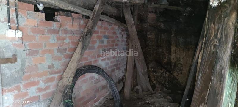 Foto cc016adc-cbc9-44df-8201-71063c79f121. Casa 60.000 casa con terreno en os peares en Peroxa (A)