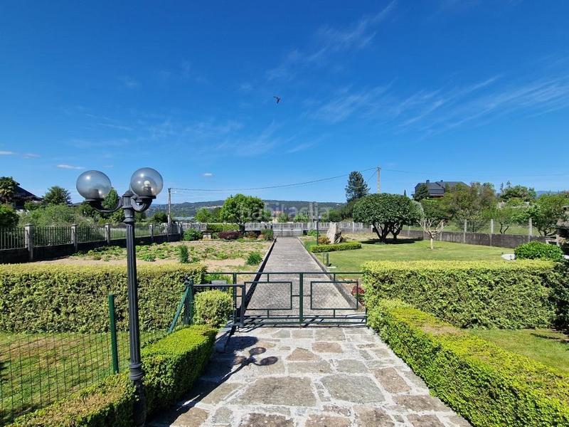 Foto 7565e128-6f04-4ba3-9fc1-4cbc1b9ea8f5. Casa 565.000 chalet con finca de 3.000m2 bus ayto en Ourense