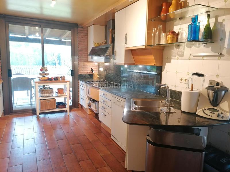 Foto 7026d09e-a9b5-4339-be19-678478a43740. Chalet with fireplace heating parking pool in Bellaterra