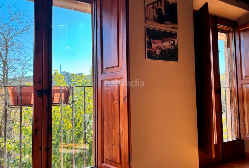 Foto 119d0323-d589-40d2-b0b3-6e0ee88c607b. Casa amb xemeneia calefacció aparcament a Palol de Revardit