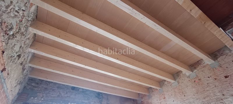 Foto b84c606a-d5ce-4974-9a47-def969c7d8e2. Casa adossada a vella 93 a Sant Celoni