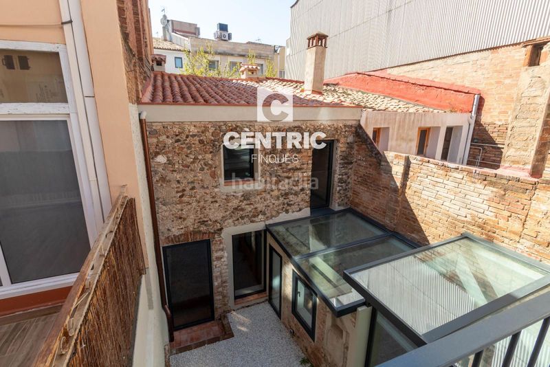 Foto e61cb2e8-e7ae-431a-ad27-8d420a284413. Casa amb calefacció aparcament a Barri del Centre Terrassa