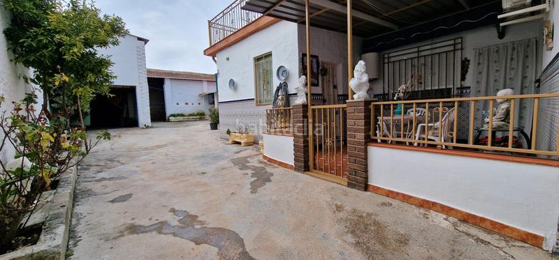 Foto 8293799a-95bc-46bc-ba49-0a825cf9d2a2. Casa adosada casa en venta en Cijuela