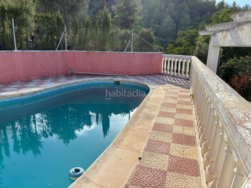 Foto 0a953f50-4800-4e00-bd9c-5747867b49cf. Casa amb aparcament piscina a Foz - Calanda