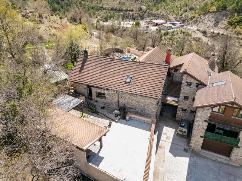 Foto a58cc291-d5c2-4ffa-b81e-9c117839f379. Masia amb calefacció aparcament piscina a Poblaciones Norte Jaca