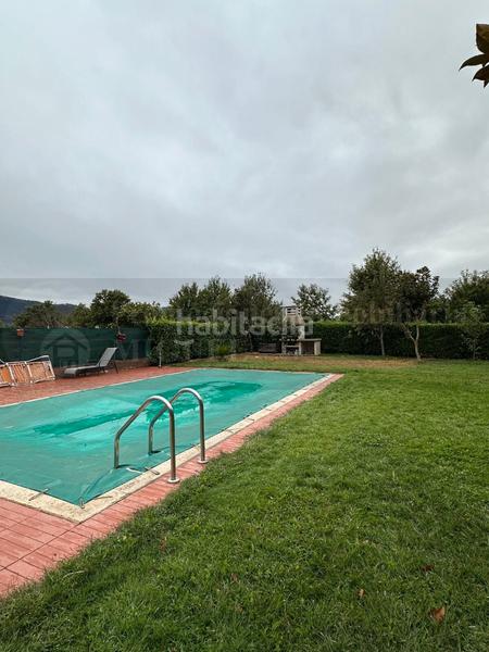 Foto 4310ebe2-5e3a-44a2-a6f9-038e2e08fba6. Chalet avec cheminée chauffage parking piscine dans Verín