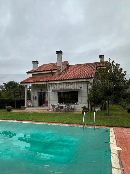 Foto f4e6aa59-bed4-4960-8cf2-12bb106ce019. Chalet avec cheminée chauffage parking piscine dans Verín