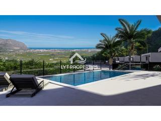 Casa en Pedreguer. Villa independiente con vistas al mar y piscina privada en pedre