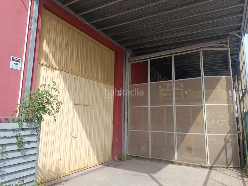 Foto a9de98ac-6ebe-4278-b974-0c12488c7587. Fabrikhalle mit heizung in Can Illa Garriga (La)