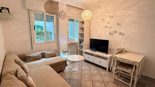 Location Appartement  Passeig marítim de sant joan de déu. Vive frente al mar – planta baja con piscina comunitaria en cala