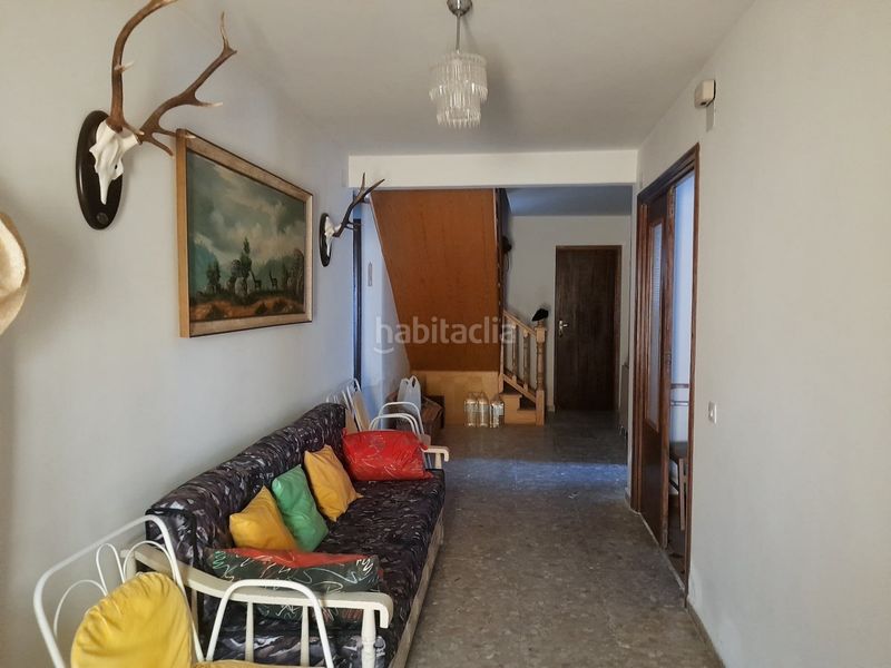 Foto d16c2eda-eee4-4e70-a27e-fb0a1d918759. Casa adossada amb xemeneia a Muñogrande