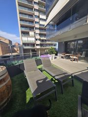 Pis  Passeig maritim. Primera linea de mar  con terraza y  piscina comunitaria
