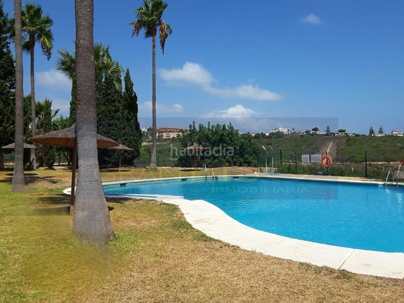 Foto 84d2f833-a8c2-4ab6-9041-b8a5047efc03. Apartamento precioso apartamento con licencia turística y amplia terraza con vistas al mar en Manilva