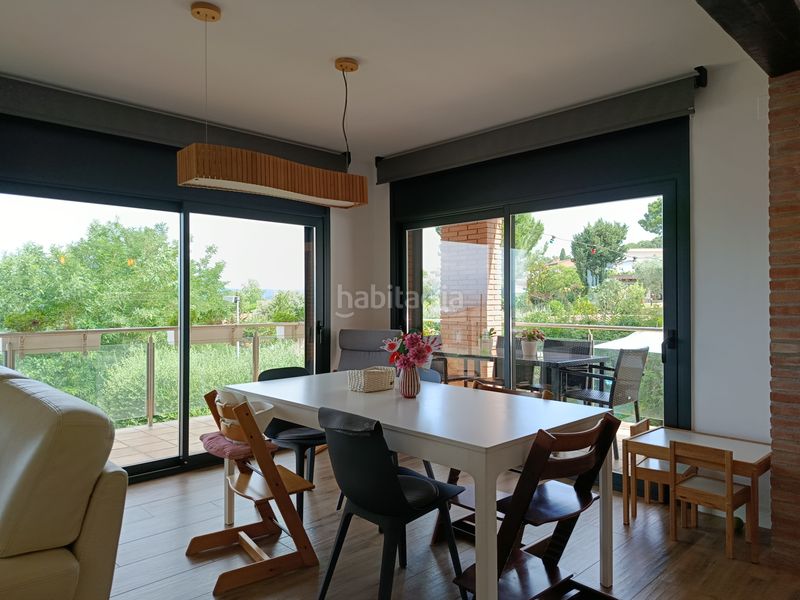 Foto c8c6ea02-a6ec-4394-a228-f3be0819f17b. Casa adossada amb xemeneia calefacció aparcament piscina a Girona