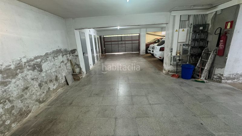 Foto 7dd62bef-b182-4764-b543-86253eaaea9c. Planta baixa amb xemeneia calefacció aparcament a Segur de Calafell