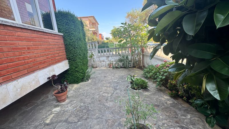 Foto 93b91ca3-3129-46c6-83a4-9d655bf7554b. Planta baixa amb xemeneia calefacció aparcament a Segur de Calafell