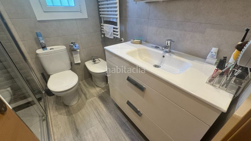 Foto bef2d037-11ba-45b1-ba42-e3414e544a6c. Planta baixa amb xemeneia calefacció aparcament a Segur de Calafell