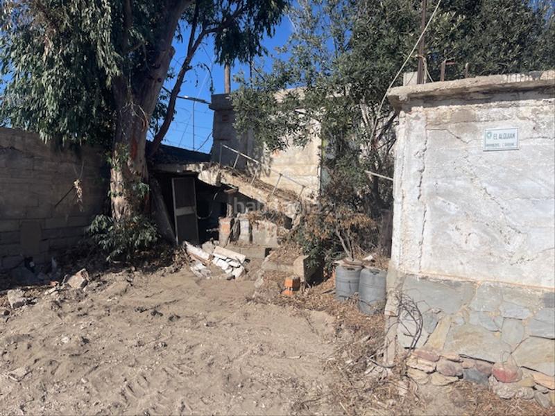 Foto 10385bfb-bfa5-4b6d-acdc-2b122c128b39. Finca rústica en carretera de alquián a viator 50 venta de parcela con cortijo y almacen en Almería