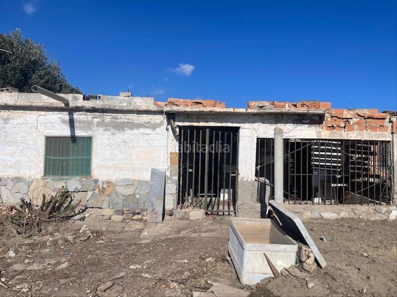 Foto f87a850b-cd7f-4b95-ba56-eba4b9fb1fc1. Finca rústica en carretera de alquián a viator 50 venta de parcela con cortijo y almacen en Almería