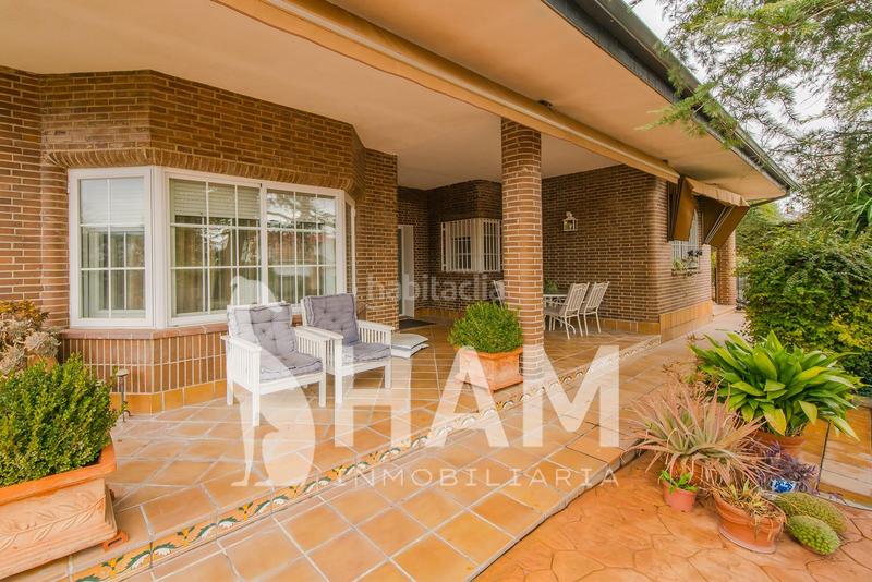 Foto 731b4eaf-1a99-491a-ba00-4a175e2cc86d. Xalet amb calefacció aparcament piscina a El Olivar de Mirabal Boadilla del Monte