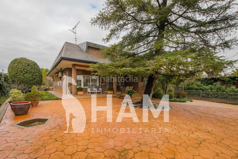 Foto b5b863a2-f5de-43ee-b54f-72a8626cd86b. Xalet amb calefacció aparcament piscina a El Olivar de Mirabal Boadilla del Monte