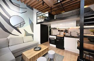 Studio  Carrer de rogent. Estudio dúplex moderno e industrial en el camp de l'arpa del clo