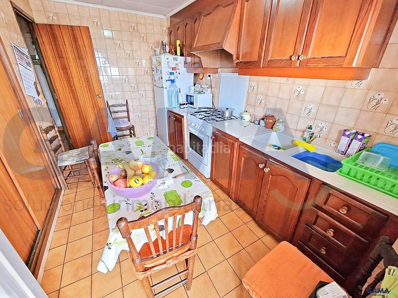 Foto 9fc654bf-d63b-43b1-84fa-995c125659ad. Casa  de 2 plantas en venta , próxima a la estación de tren! en Carcaixent