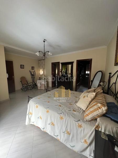 Foto 3d887e6d-25ea-4415-82b9-6fcb93360710. Casa con parcheggio in Oromana Alcalá de Guadaira