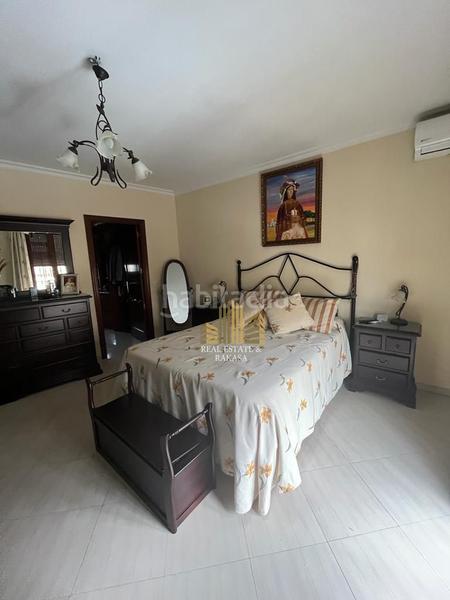 Foto c085070c-a3ec-475f-8bf3-02ba4b4a38a9. Casa con parcheggio in Oromana Alcalá de Guadaira