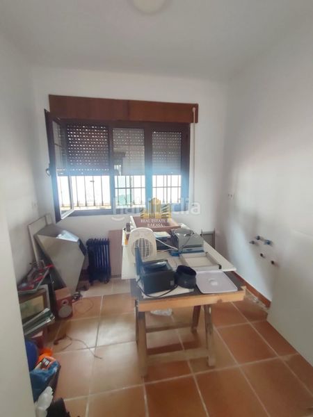 Foto cd2aa949-12fa-46b7-b3ca-3e57ba62fee1. Chalet with parking in Oromana Alcalá de Guadaira