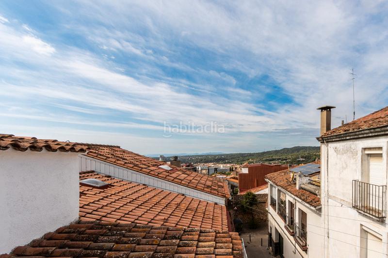 Foto 443d4237-adc8-4ebd-8208-005e0d6be734. Casa aparellada amb xemeneia calefacció aparcament a Castellar del Vallès