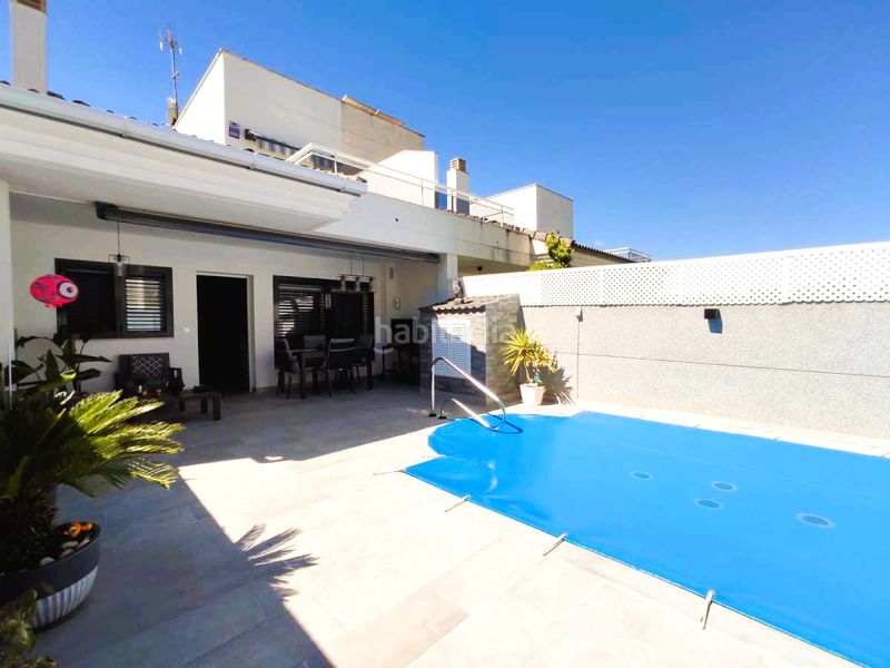 Foto b40b1d4c-b028-45a8-8fff-bf08d91f0bb0. Casa adossada amb aparcament piscina a Corinto-Almardà Sagunt