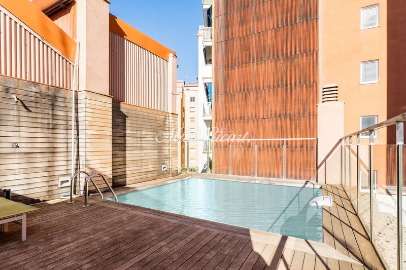 Foto 23ac7a34-ddff-43b2-bd29-16a4b8254d73. Casa amb calefacció aparcament piscina a Sant Andreu de Palomar Barcelona