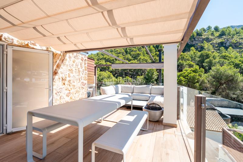 Foto dd0a35c2-9be4-4473-ac50-e8c31af22e0b. Maison jumelée avec cheminée piscine dans Cala Sant Vicenç Pollença
